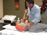 Physical Therapist treating patient