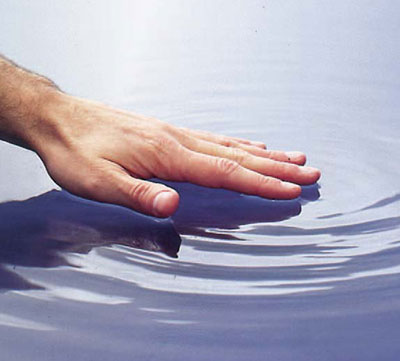 hand on water
